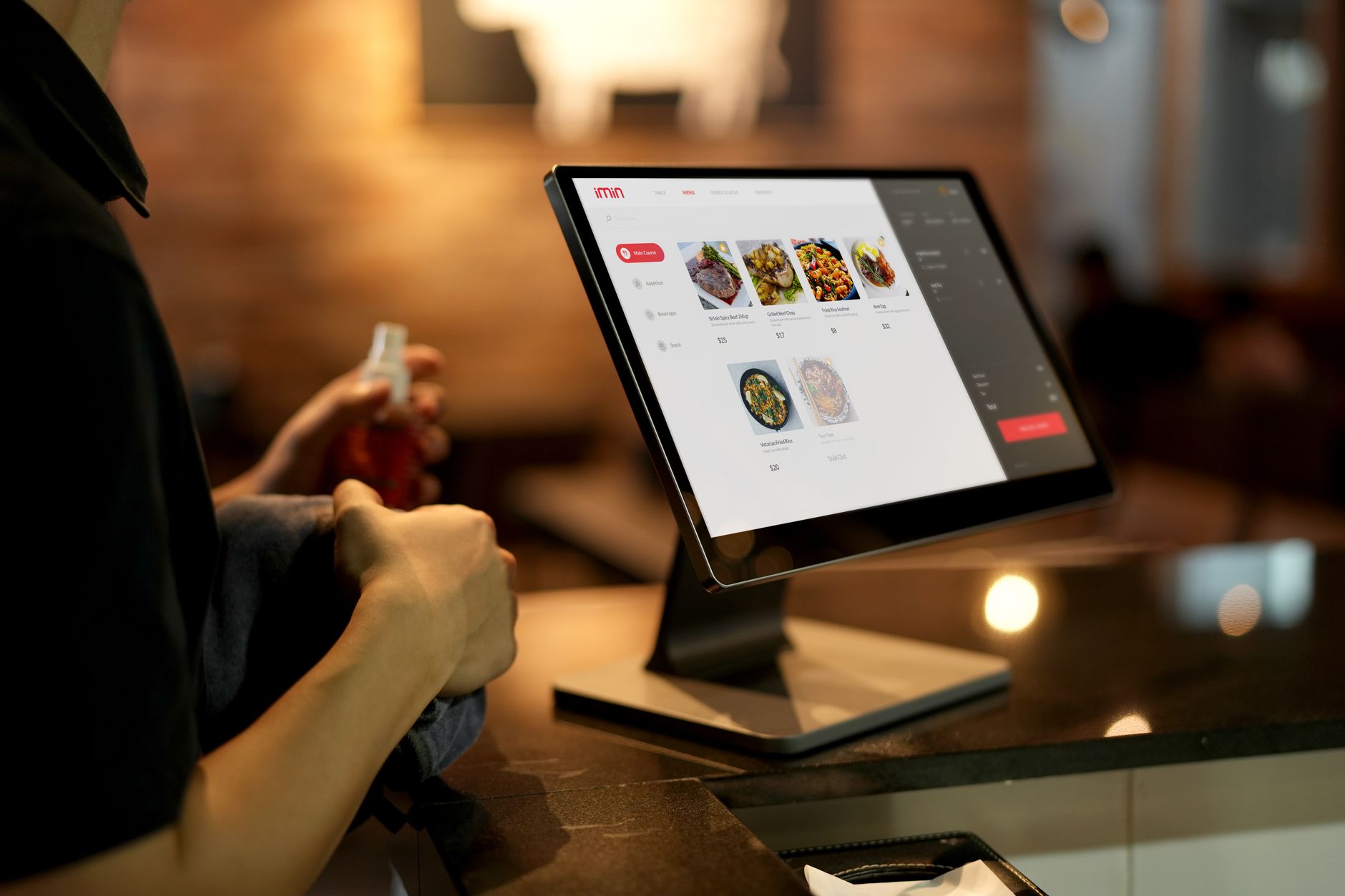 Restaurantteam mit einem Point of Sale System